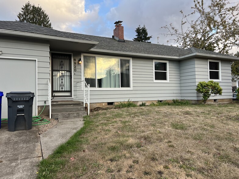 House with attached garage and driveway - 6920 N Macrum Ave