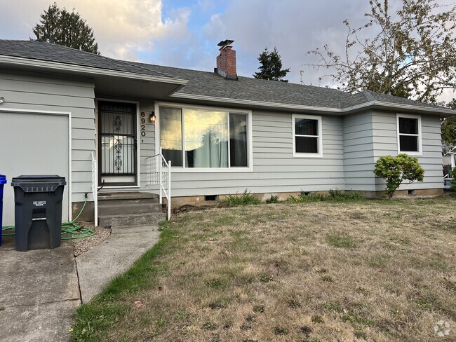 House with attached garage and driveway - 6920 N Macrum Ave