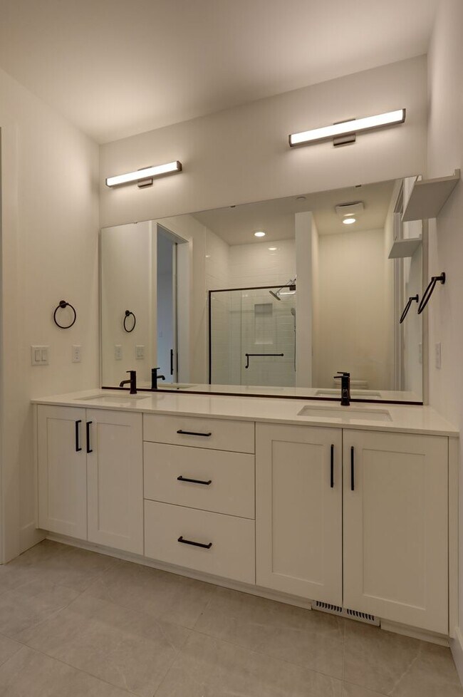 Building Photo - Live Where Style Meets Convenience – 2BR Townhome + Garage