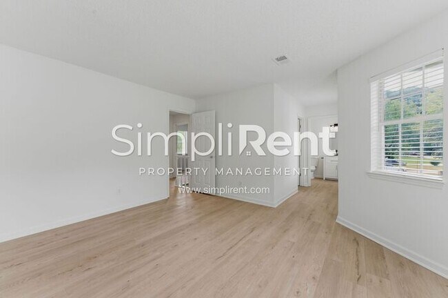 Building Photo - Updated Home with Spacious Layout & Private Backyard