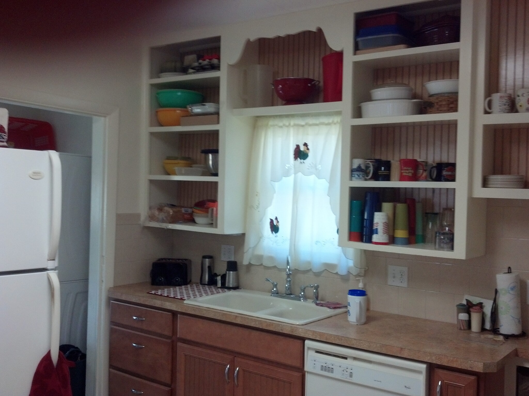 Kitchen sink, counter tops and open shelving (furnishings not included with rental) - 607 Harrison Ave