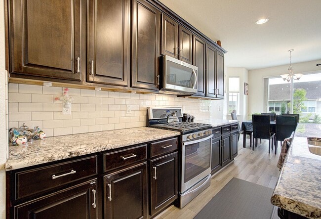 Building Photo - Bright, Spacious & Full of Charm Inside an...