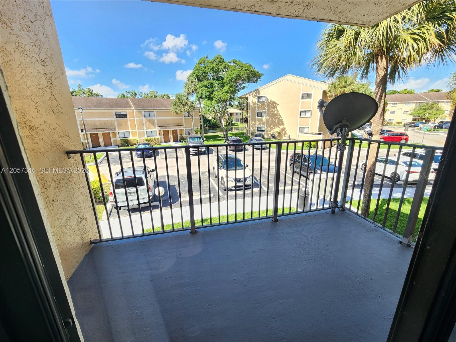 Building Photo - 9491 Palm Cir S