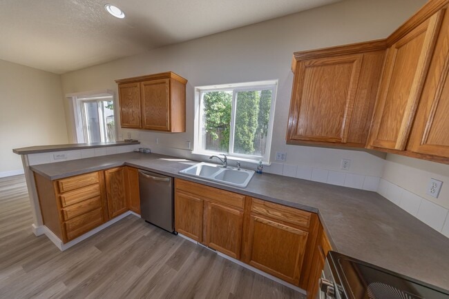 Building Photo - Three bedroom home in Orchards. - JUST UPDATED