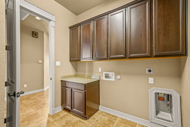 Building Photo - Spacious 4-Bedroom Home with Game Room in Desirable Community!