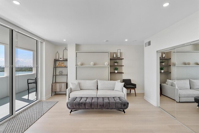Building Photo - 10275 Collins Ave