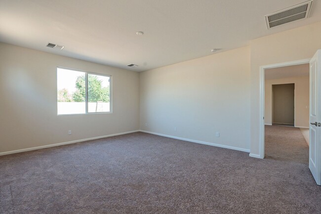 Building Photo - Beautiful New Spacious Home Includes 3 car...