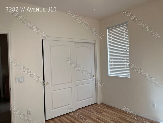 Building Photo - 3282 W Ave J 10