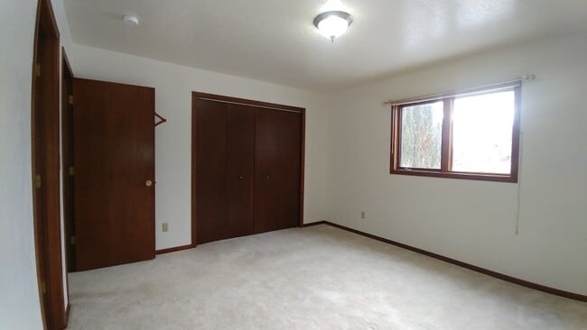 Building Photo - Home in Lolo with Fenced Yard and Pets Considered