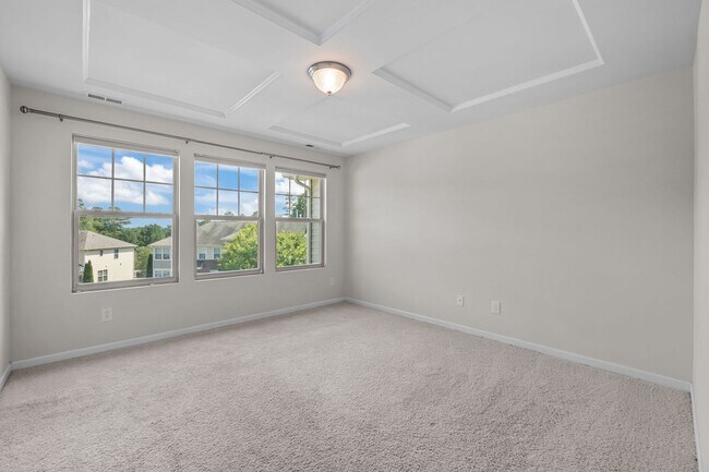 Building Photo - Modern 3-Bed Townhome in Thompson Ridge – ...