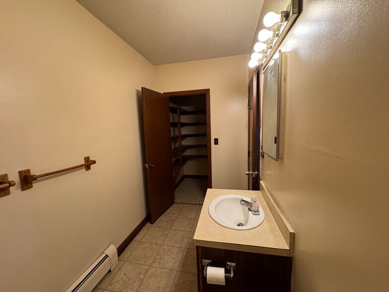 Bathroom w/ linens closet/pantry - 67 E Main St