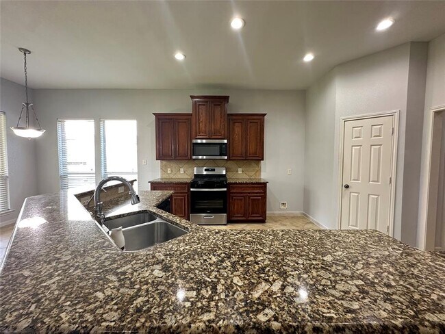 Building Photo - 5218 Pebble Bluff Ln