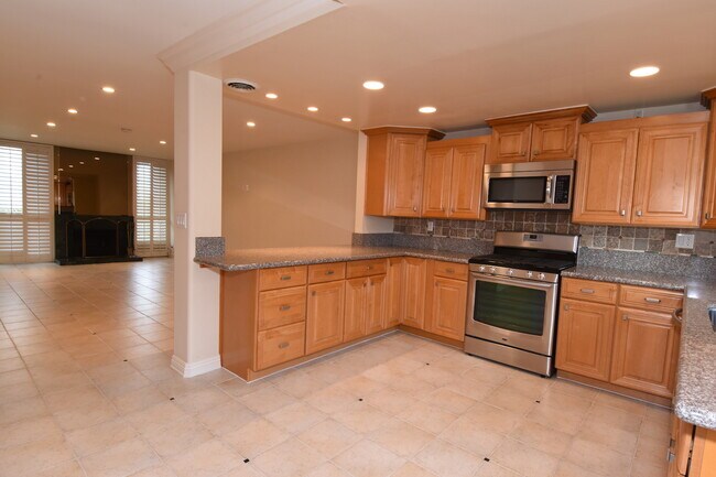 Kitchen is open the the Dining & Living Rooms - 3610 W Estates Ln