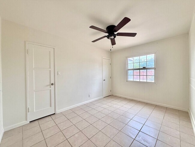Building Photo - Spacious Three-Bedroom Two-Bathroom Home with large yard $3,095