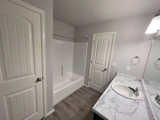 Building Photo - Townhome w/ 2 car garage, A/C-Newer, Low Maintance, & Conviniently Located