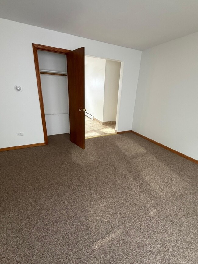 Building Photo - 7612 W Belmont Ave