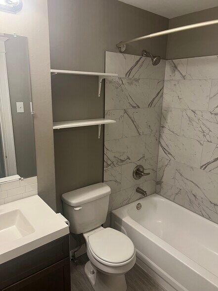 Newly tiled shower with full size tub - 5201 Murdoch Ave