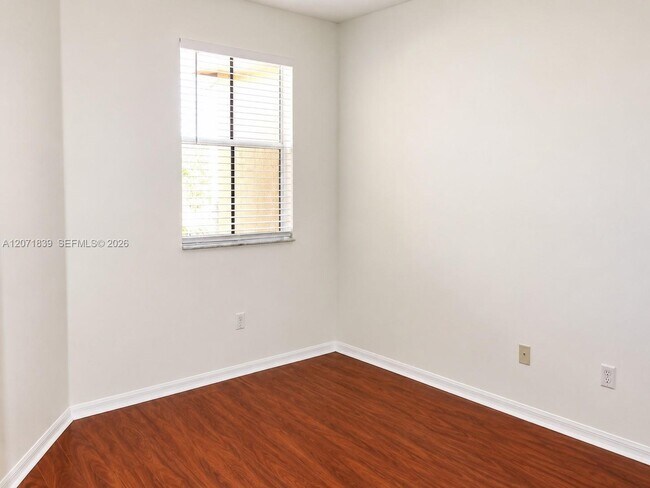 Building Photo - 4974 White Mangrove Way E