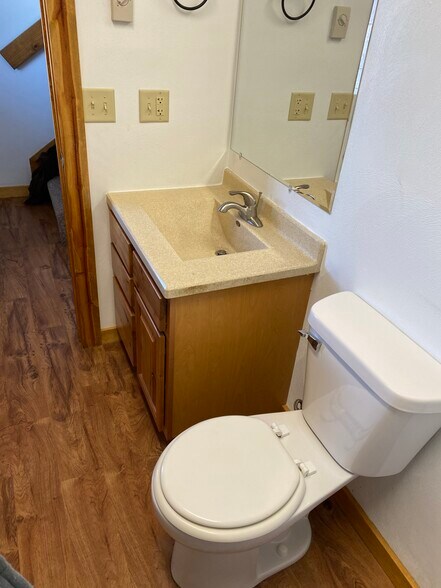 Half bath with W& D hookups - 1073 Lakeshore