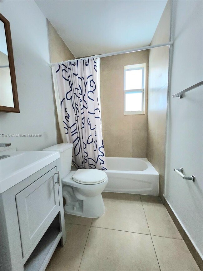 Building Photo - 7936 Harding Ave