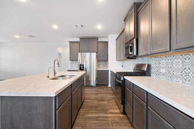 Building Photo - Homey 4 Bedroom, 2 Bath, 1-Story Home in H...