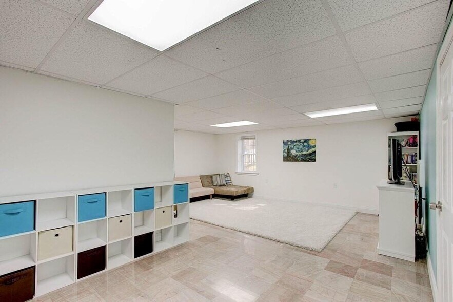 Basement - Virtually staged - 16 Knoll Rd