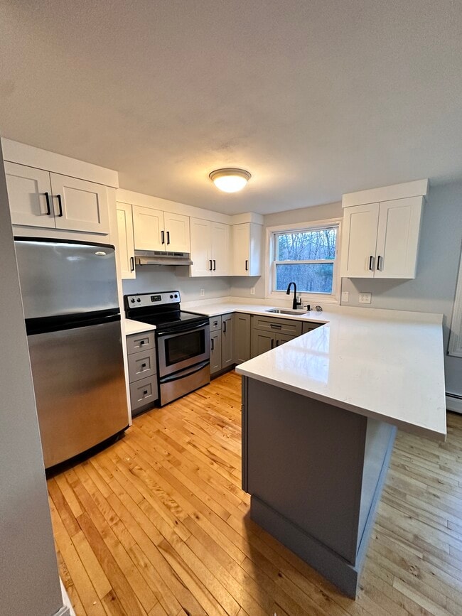 Remodeled kitchen with quartz counter tops - 36 Tenney Rd