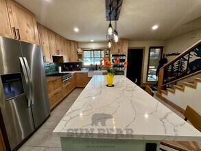 Building Photo - Beautiful Home on the Creek in Glenrock! - Summer pool in complex!