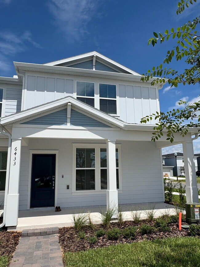 Building Photo - Live Large in Winter Garden: Modern 4-Bedroom Townhouse Haven