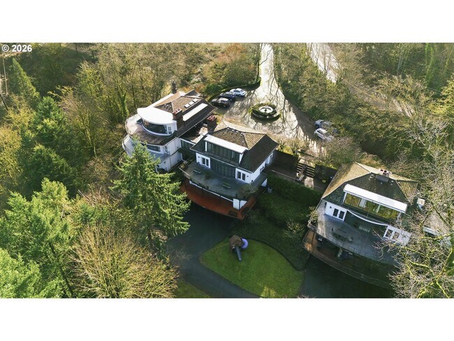 Building Photo - One-of-a-Kind 5BR Home with Floor-to-Ceiling Windows, Wraparound Decks & Breathtaking Treeline Views