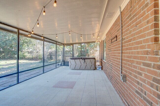 Building Photo - Lakefront 3BR/2BA Home on Orion Lake with Florida Room, Screened Patio, Hot Tub (As-Is), Solar Pa...