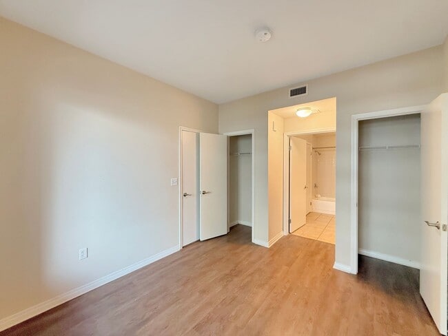 Building Photo - Newly Remodeled 2B/2BA condo w/ Reserved P...