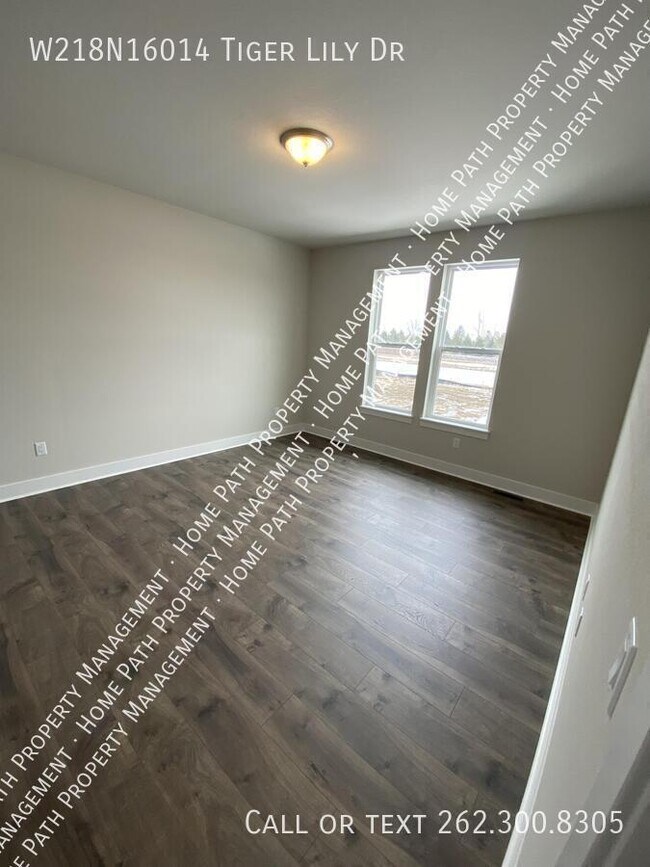 Building Photo - W218N16014 Tiger Lily Dr