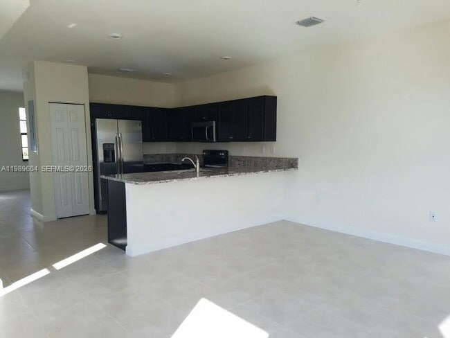 Building Photo - 9205 W 33rd Way