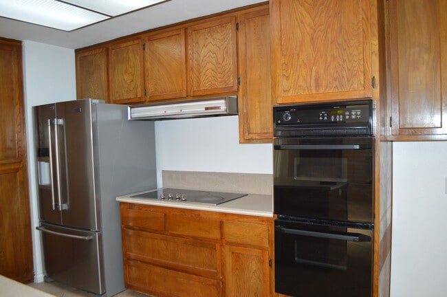 Building Photo - Four Bedroom, Two Bathroom Single Story Home With Two Car Garage