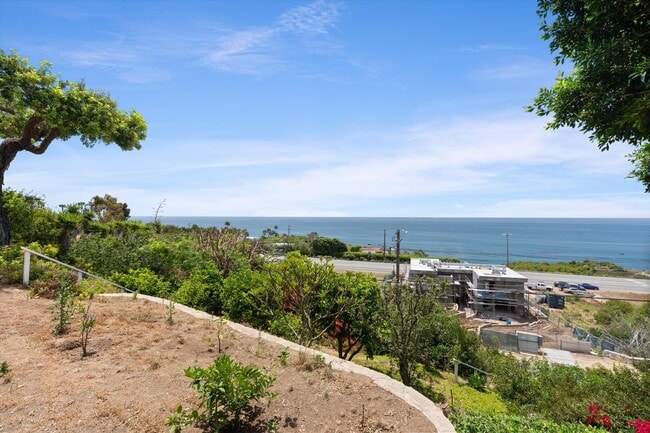 Building Photo - 4986 Puesta Del Sol