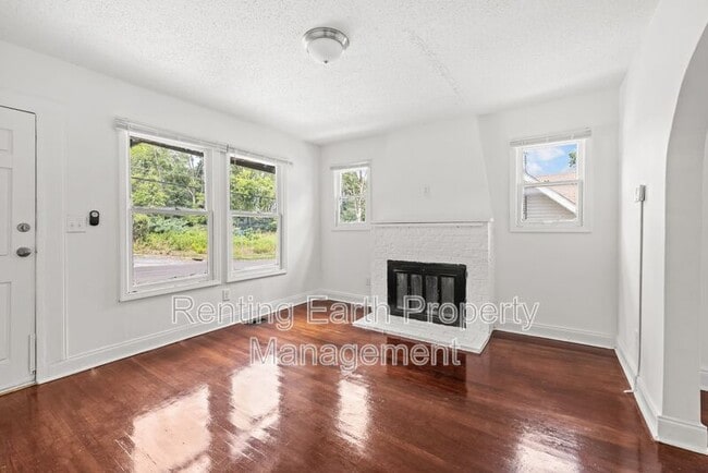 Building Photo - 8215 Rugby Ave
