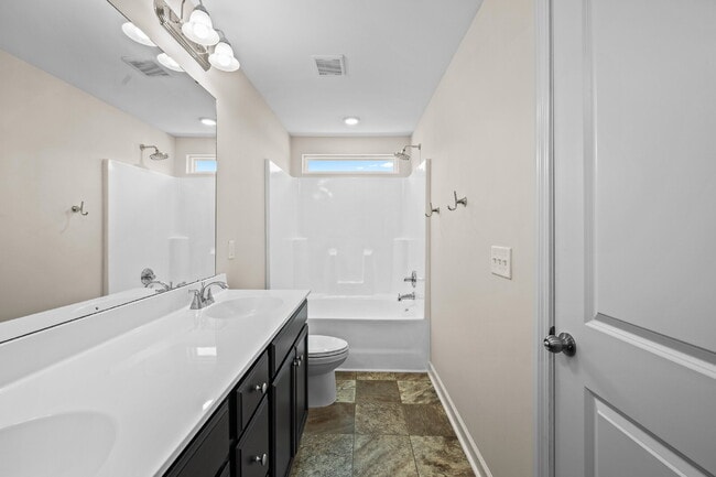 Building Photo - Charming 2-Bedroom, 2.5 Baths Townhouse in...