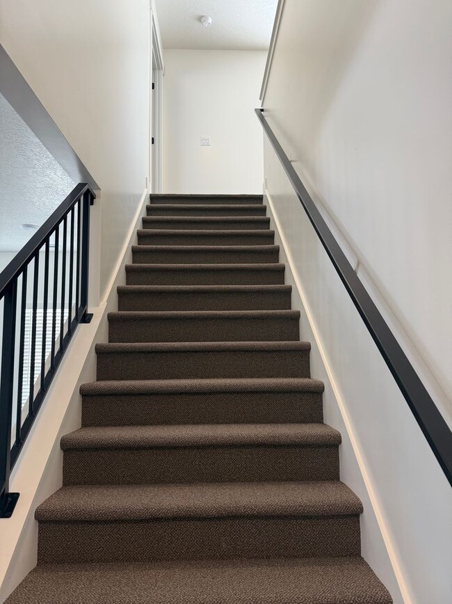 Building Photo - Half off first months rent - Beautiful townhome with 2 car garage, Central Air and Master Suite