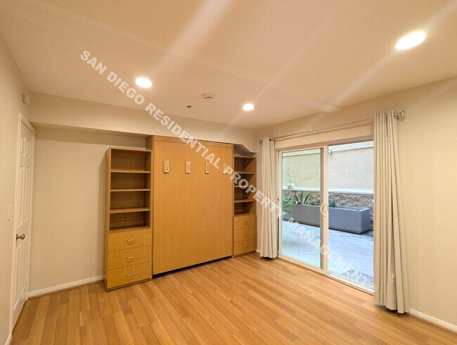 Building Photo - Updated Studio with Parking and Washer/Dryer in Prime Little Italy Location