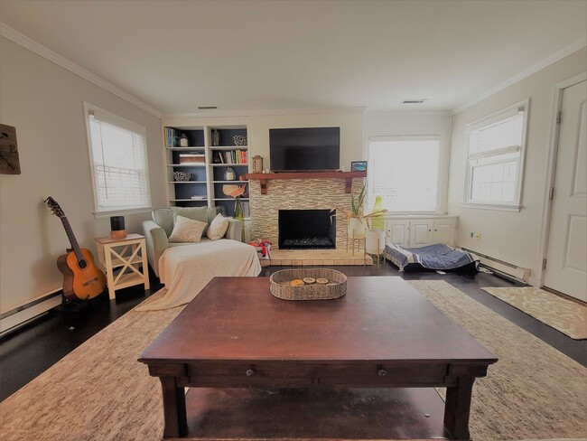 Building Photo - Remodeled 4 bedroom 2 full brick bath cape...