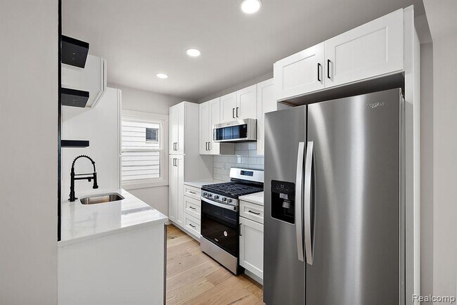 Building Photo - 308-310 East Harry Ave