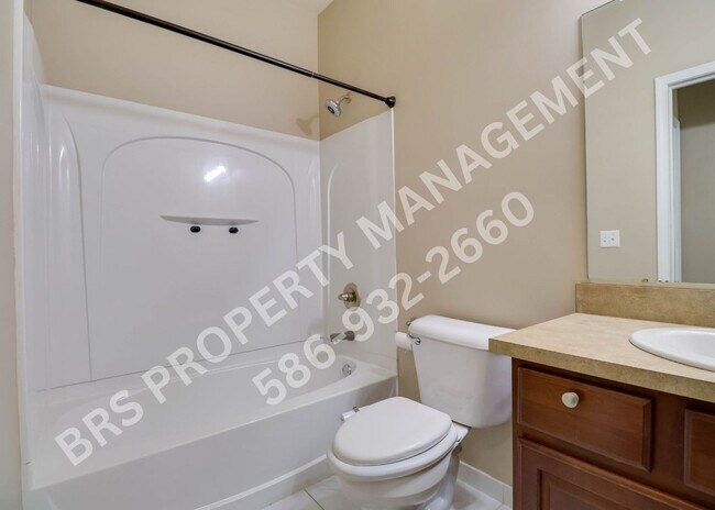 Building Photo - Ground Floor 2 BR, 2 BA condo with attached garage