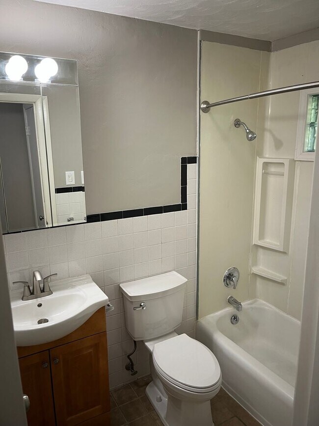 Building Photo - Spacious Two-Level Home with Dual Living Areas, 2 Kitchens & Covered Back Deck!