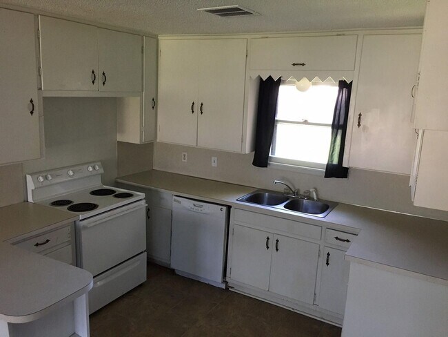 Building Photo - 1425 Mimosa Dr