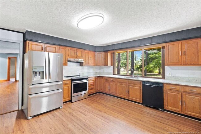Building Photo - 3450 Cornell Dr