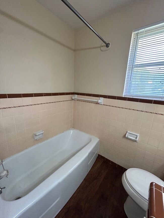 Building Photo - Beautiful Corner Lot Living