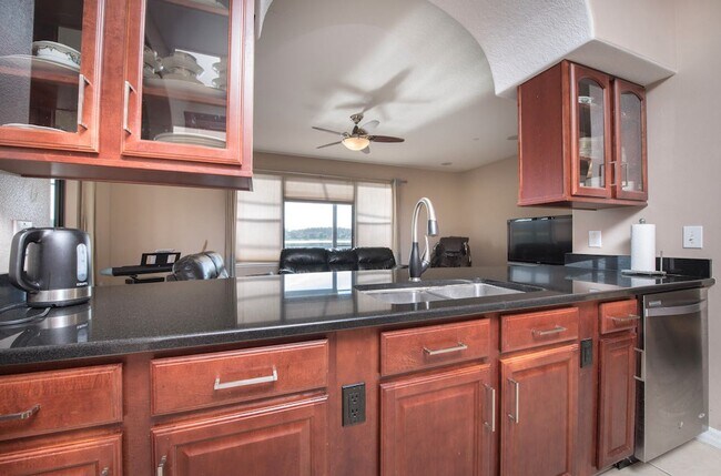 Building Photo - Large, Executive style 3/2.5 Lakefront/POOL Home in East Park of Lake Nona