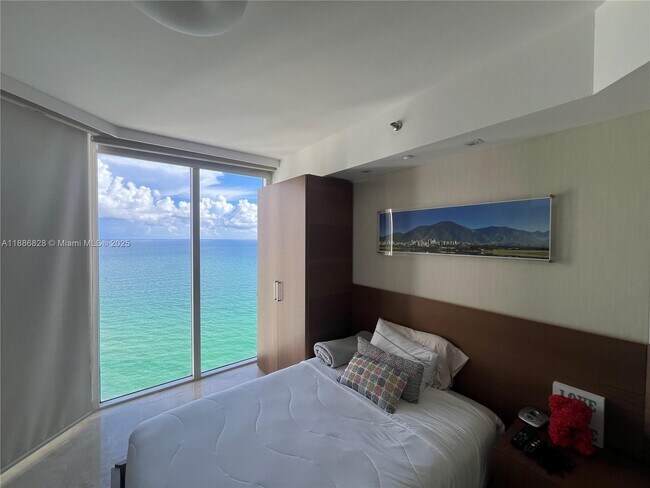 Building Photo - 19333 Collins Ave