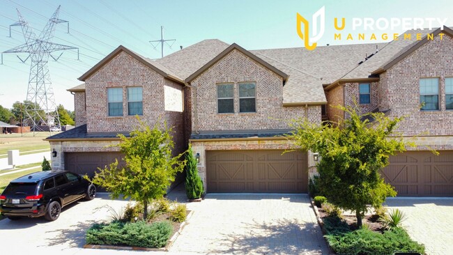 Building Photo - 4 bed and 3.5 bath Townhome in Plano!